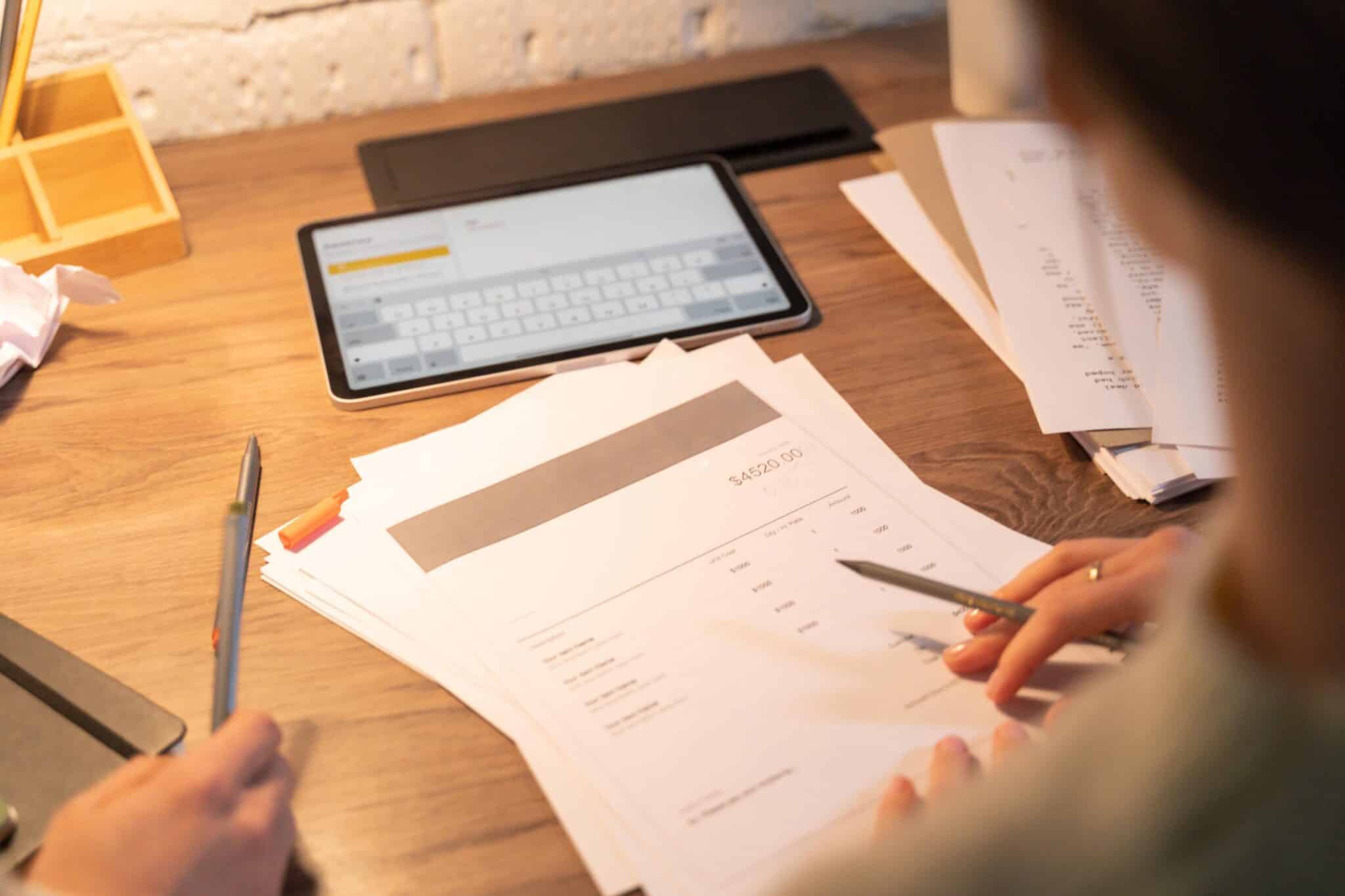Virtual legal assistant working on case strategy and planning documents in a professional workspace.